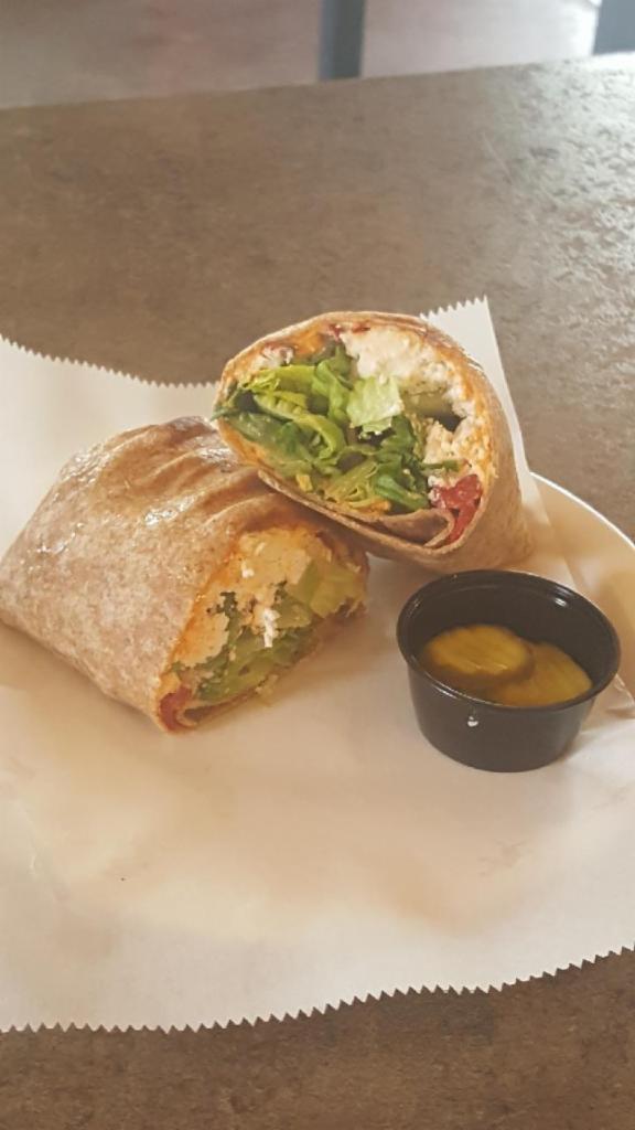 Mediterranean Veggie Medley Wrap · Chopped romaine, feta, hummus and roasted red peppers.