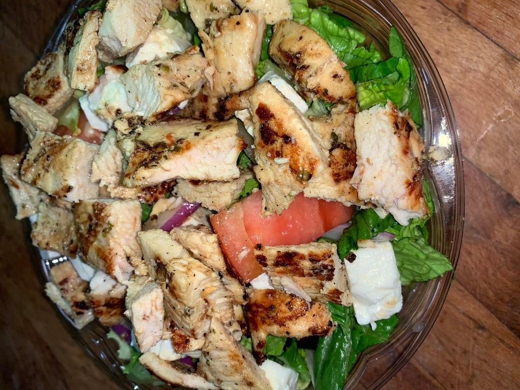 Chicken Caesar Salad · Grilled seasoned chicken over romaine lettuce