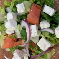 Greek Salad · Iceberg lettuce , tomatoes,cucumbers,black olives & onions Topped with feta cheese