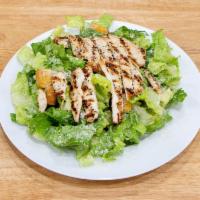 Chicken Tossed Salad · Iceberg lettuce , tomatoes,cucumbers,black olives & onions Topped with grilled seasoned chic...