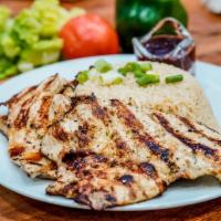 Grilled Chicken Breast · Grilled chicken breast on charcoal grille , Comes with rice or skin-on fries.
