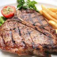 Steak ·  Juicy tender 18 ounce steak, cooked to perfection. Served with your choice of fries OR rice...