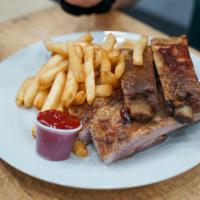 Whole Pork Ribs · Baby back ribs home made seasoned , Comes with rice or skin-on fries.
