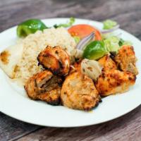 Shish kebab chicken  · Marinated cubes of chicken breast,
Served with rice , salad & side of tzatziki sauce.