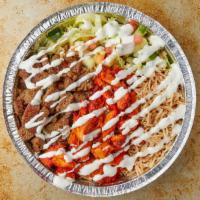 Chicken & Lamb Over Rice · Halal grilled chicken and lamb with grilled onions and peppers topped with white sauce Serve...