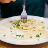 Pasta Alfredo · Served in cream sauce and Parmigiana cheese. Served with choice of pasta.