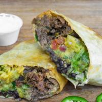 Philly Cheese Steak Burrito · Served with lettuce, rice, black bean, cheddar cheese, guacamole, salsa and sour cream in yo...