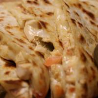 Chipotle Chicken Quesadilla · Grilled chicken, mozzarella chees,e tomato and jalapenos. All natural, no antibiotics, no ho...