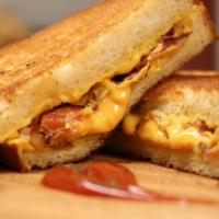 Grilled Cheese Sandwich with Turkey Bacon · Homemade bread.
