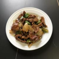 Pepper Steak with Onion Platter · Stir fried steak with vegetables and a savory sauce.