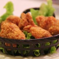 Fried Chicken Wings · 4 pieces. Cooked wing of a chicken coated in sauce or seasoning.