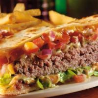 2. Quesadilla · Homemade flour tortilla, shredded melted cheese, sour cream, fresh cheese and choice of meat...