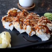 Buddha Roll · Salt water eel, spicy kani kama, tempura shrimp, masago, tempura flake, eel sauce.