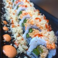 The Kraken Roll · Octopus, spicy kani kama, asparagus, tempura flake, togarashi, spicy mayo, lava sauce.