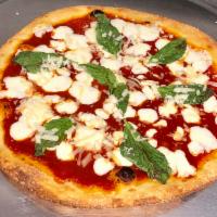  Margarita Pizza · Tomato sauce, fresh basil, olive oil and fresh mozzarella.