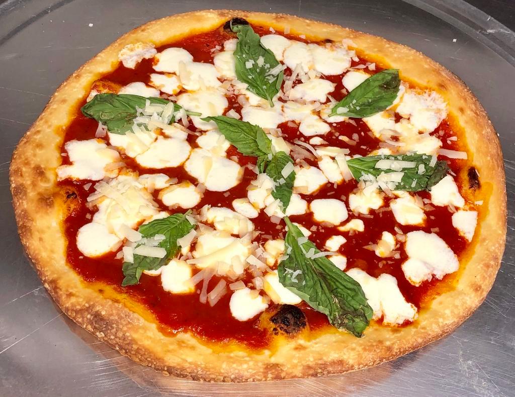  Margarita Pizza · Tomato sauce, fresh basil, olive oil and fresh mozzarella.