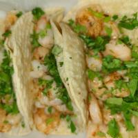 3 shrimp Paisa Tacos · corn tortilla,radish,cucumbers,chopped onions,cilantro,salsa verde 