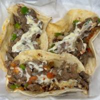 Grilled Steak (Asada Gabacho Tacos) (3 pcs) · Grilled steak. Flour tortillas served with pico de gallo, cheese, sour cream, and salsa.