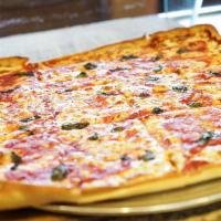 Large Nonna Pizza · Thin crusted square pie with marinara sauce, fresh basil and fresh mozzarella.