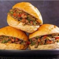 Beef Shawarma Egyptian Gyro  · Beef and lamb with tomato onion Parsley and Tahini sauce