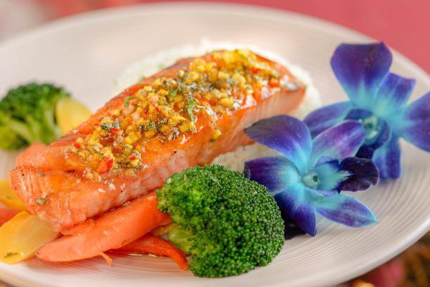 Grilled Salmon · Grilled salmon served with sauteed carrots, broccoli, & rice
(Salmon a la parrilla acompañada de arroz, zanahorias &  brocoli salteado)