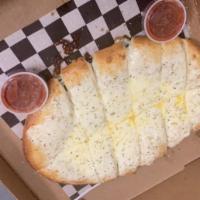 Garlic Cheese Breadsticks with Marinara · One pound of pizza dough baked crisp and topped with garlic butter and fresh mozzarella chee...