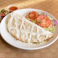 Quesadilla · inside - lettuce, cheese ,cilantro, onion and on top sour cream ,granulated cheese 
served w...