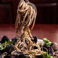 Linguine al Frutti di Mare · Clams - mussels - calamari - shrimp -  squid ink sauce