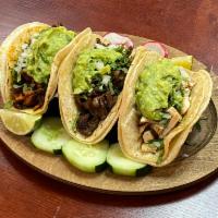 1. Carne Asada Taco · Grilled beef. Served with cilantro, onions and guacamole.