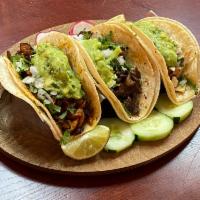 5. Al Pastor Taco · Spit grilled pork. Served with cilantro, onions and guacamole.