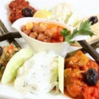 Mixed Appetizers Plate · A healthy portion of the chef's selection of appetizers.