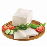 Feta Cheese · A generous portion of fresh feta cheese.