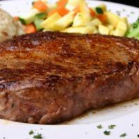 Ribeye Steak  · Grilled ribeye steak, with sauteed vegetables, rice and herbed home-fried potatoes. Served w...