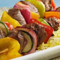 Lamb Shish Kebab   · Special marinated cubes of baby lamb, grilled to delight on skewers. Served with rice. very ...