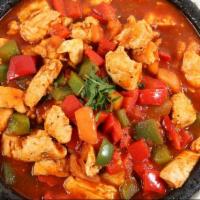 Chicken Sautee · A delicate combination of chicken breast, onions, greens, red peppers, tomatoes and garlic, ...