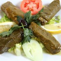 Stuffed Grape Leaves · Homemade. Grape leaves stuffed with special seasoned rice and pine nuts topped with olive oil.