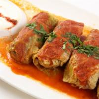 Stuffed Cabbage · Cabbage leaves stuffed with ground lamb, rice, fresh parsley, red bell peppers, fresh dill, ...