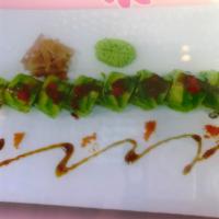 Green Dragon Roll · Eel and cucumber inside with avocado and caviar on top.