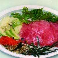 Tuna Bowl · Tuna, avocado and caviar with sushi rice. 