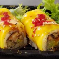 Golden Dragon Roll · Eel,cucumber,avocado,inside,topped with mango and chef's special sauce