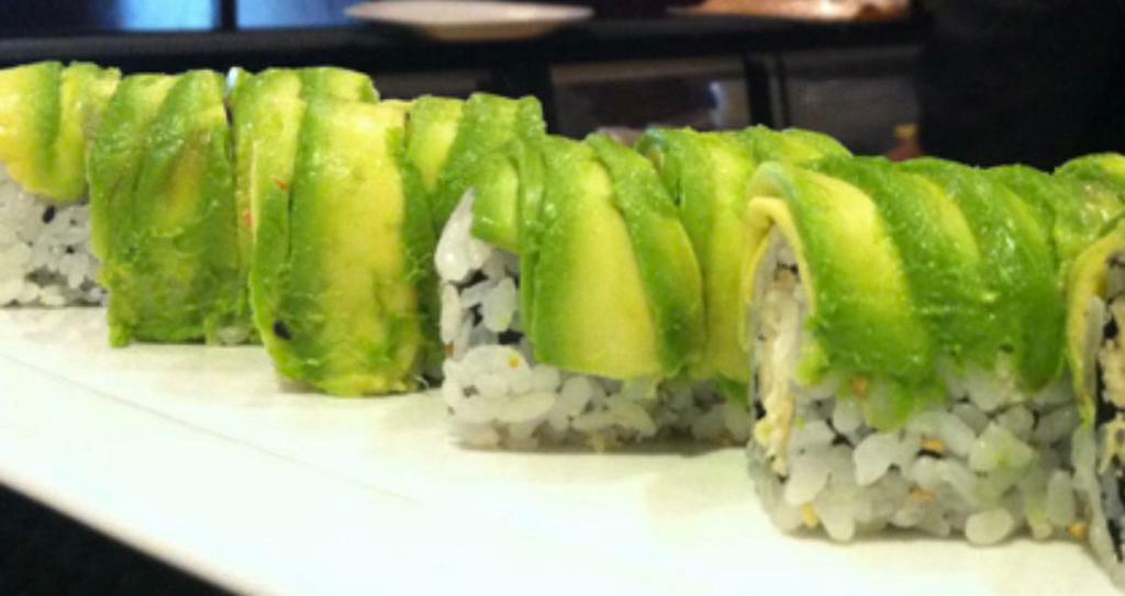 Veggie Dragon Roll · Avocado cucumber roll with avocado on top. (8pcs)
