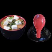 Miso Soup (Cup) · Cup. White miso broth with tofu cubes, wakame seaweed, and green onions.