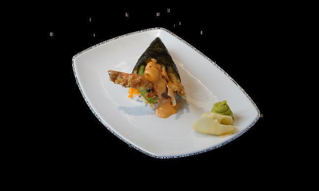 Spider Hand Roll · Soft shell crab, cucumber, avocado, and masago caviar. Topped with creamy chipotle sauce. Traditional and cone shaped hand rolled sushi.