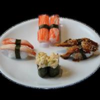 Sushi Sampler · Assortment of nigiri and sushi including tuna, salmon, yellowtail, octopus, and shrimp.