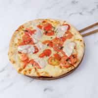 Bruschetta Pizza · Fresh plum tomatoes, basil, fresh mozzarella, garlic and olive oil.