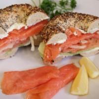 Sliced Salmon Sandwich · Sliced nova with any choice of cream cheese, ice berg lettuce, tomato and onion.