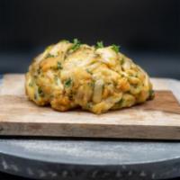 The Queen City Burger · Our signature colossal crab cake with jumbo lump crab meat blended with savory seasonings, d...