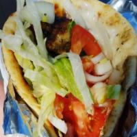 Chicken Pita · Includes tzatziki, lettuce, tomato, onions