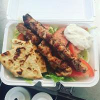 Pork Platter · served with french fries or rice, side salad and pita