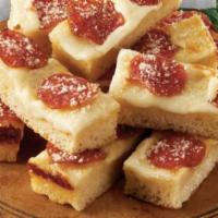 Pepperoni Cheese Bread · Ten pieces of freshly baked bread with crispy edge, covered with cheese, pepperoni and sprin...